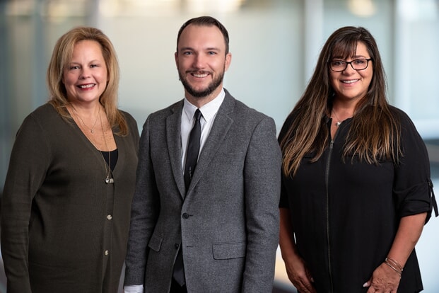 From left: Kelly (Medical Secretary), Dr. Ryan Unger, and Christine
(Registered Nurse)